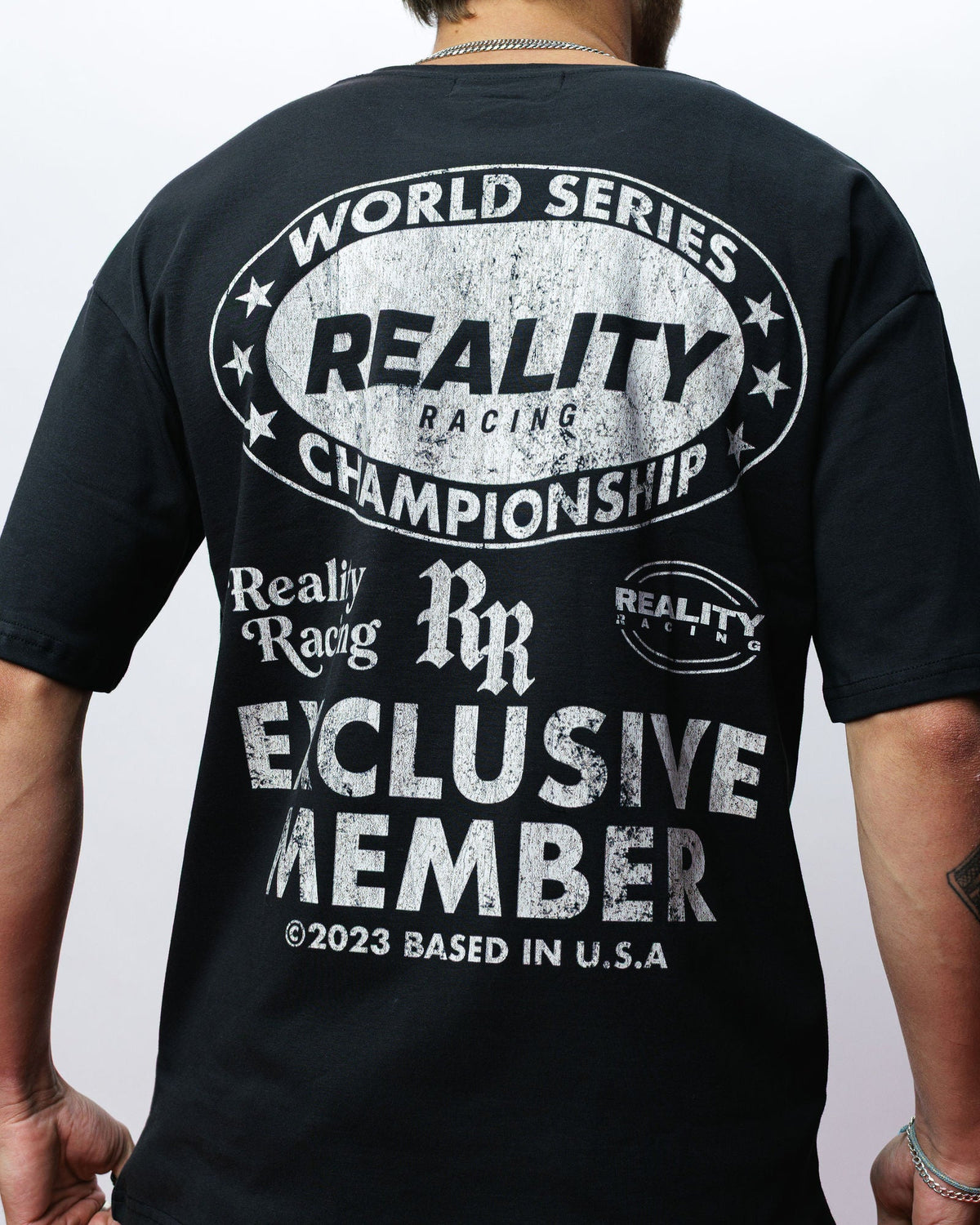 Reality Exclusive Members Tee, on model