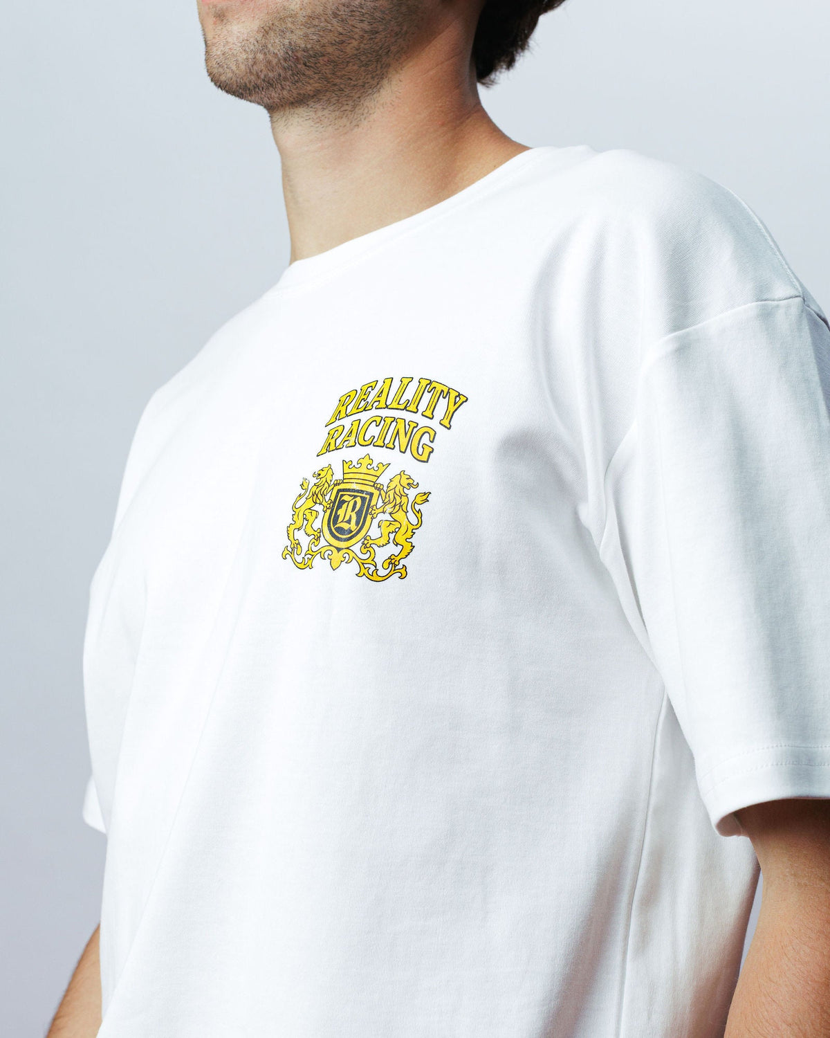 Reality Crest Tee, on model