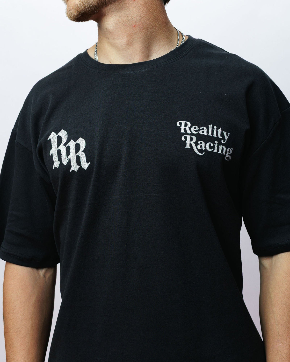Reality Exclusive Members Tee, on model