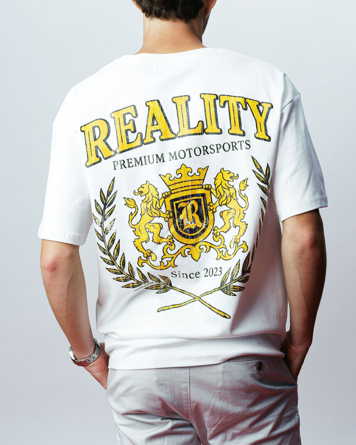 Reality Crest Tee, on model
