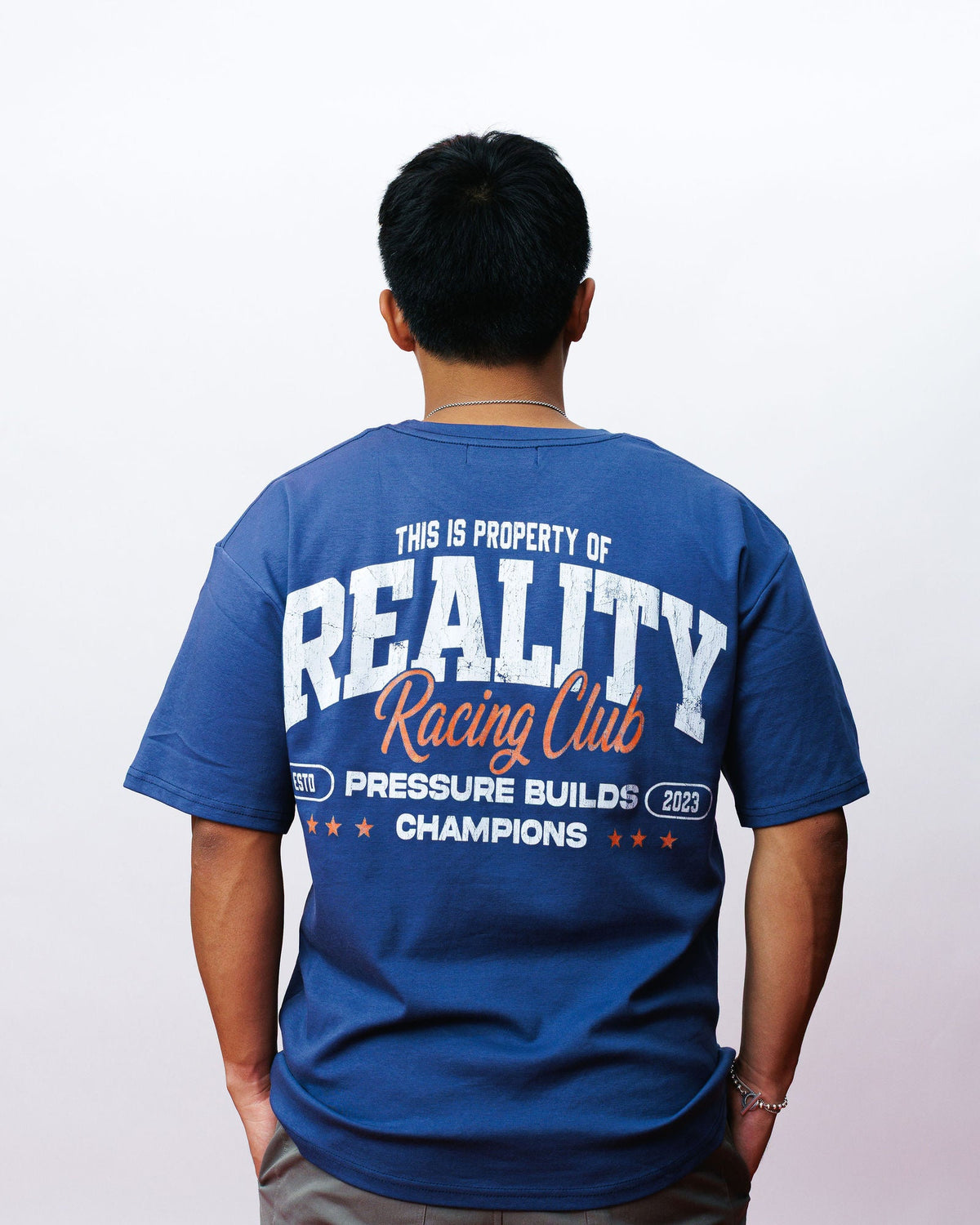 Reality Racing Club Champions Tee, on model